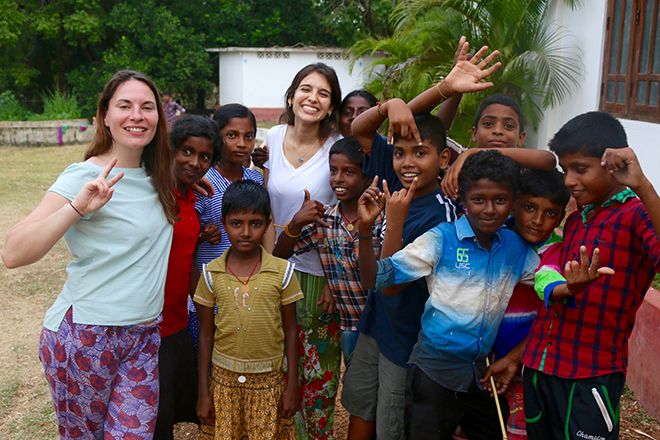 Kingston University students play games with Sri Lankan children during a three week volunteering expedition with Lebara Foundation